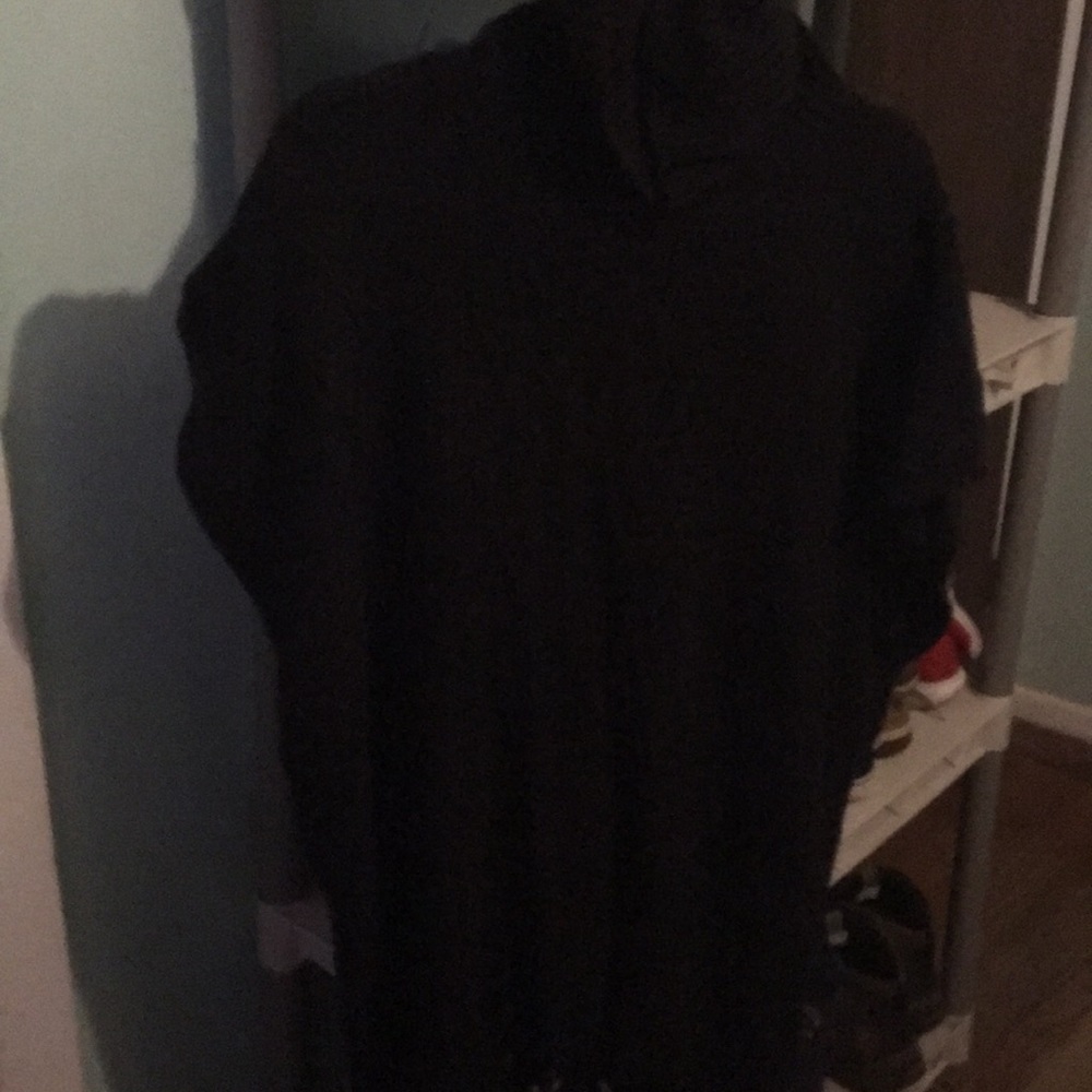 Black turtle neck fringed short sleeved